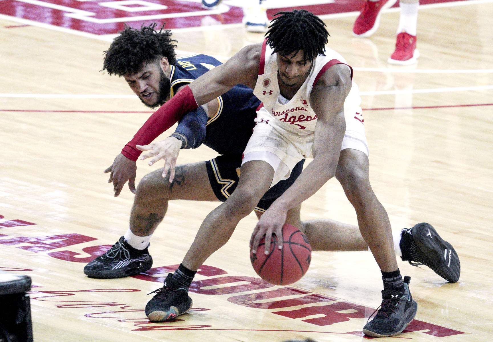 Michigan 67, UW 59